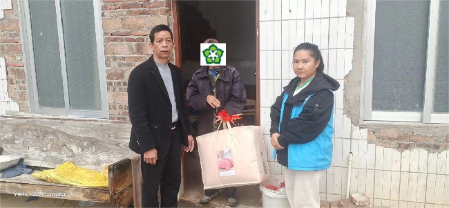 坝仔镇开展“寒冬送棉被，关爱暖人心”特殊困难群众慰问活动.jpg