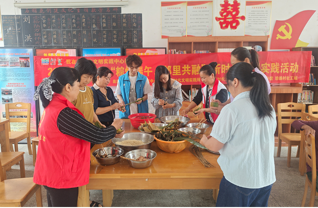 坝仔镇珍珠村开展“粽情端午・邻里共融” 主题活动.png